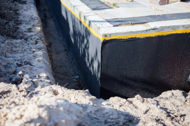 Professional Waterproofing technician working in Hope Hull, AL